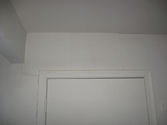 Typical wall crack above a door